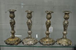 A good set of four Sheffield Rococo style embossed silver candlesticks, Sheffield 1836 & 1839.