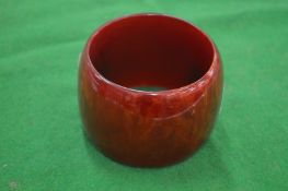 A cherry amber style bangle.