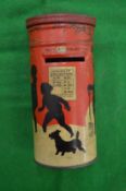 Huntley & Palmers, a small pillar box style money box decorated with children playing in the snow.