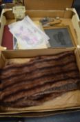 A fur stole and other items.