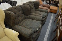 A pair of large Victorian button upholstered armchairs.