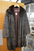 A ladies fur coat.