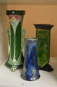 A Royal Doulton Art Nouveau vase and two secessionist vases.
