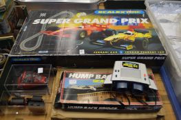 A Scalextric Super Grand Prix racing set and other toys.