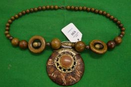 A chunky bead necklace.