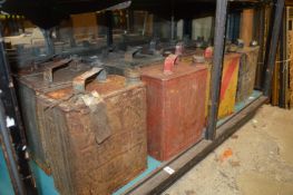 A good collection of twelve old petrol cans complete with caps.