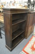 An oak open bookcase.
