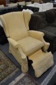 A Parker Knoll reclining armchair.