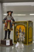 A model of a Cavalier and a pewter model of a soldier.