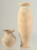 TWO EARLY POTTERY VASES.