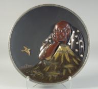 A LARGE JAPANESE MEIJI PERIOD CAST BRONZE AND MIXED METAL CHARGER, with relief depiction of a