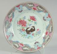 A CHINESE FAMILLE ROSE PORCELAIN CHARGER, enamel painted with birds and native flora, 35cm