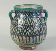 A FINE LARGE 16TH-17TH CENTURY OTTOMAN DAMASCUS GLAZED POTTERY TWIN HANDLED VASE, 22cm high.