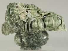 A LARGE CHINESE SOAPSTONE CARVING of a basket of fruit / vegetables, 26cm wide.