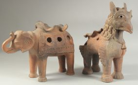 TWO 19TH CENTURY INDIAN POTTERY FIGURES.