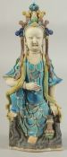 A CHINESE FAHUA-TYPE GUANYIN, 27.5cm high.