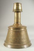A RARE MONUMENTAL 14TH-15TH CENTURY MAMLUK ENGRAVED BRASS CANDLESTICK, depicting fine large-scale