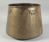 A MAMLUK REVIVAL BRASS OPENWORKED JARDINIERE, with engraved panels of calligraphy and decorative
