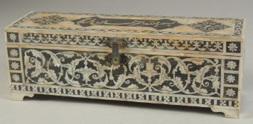A TURKISH MOTHER OF PEARL INLAID RECTANGULAR BOX, the hinged lid with calligraphic panel, 28.5cm