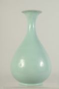 A CHINESE CELADON RU WARE BOTTLE VASE, 28cm high.