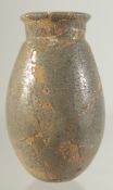 A SMALL STONE VASE WITH UNUSUAL METALLIC SPECKLED GLAZE, 12cm high.