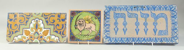 THREE GLAZED POTTERY TILES, (3).