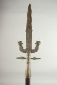 AN ISLAMIC SILVER AND COPPER INLAID DAMASCUS STEEL SPEAR, with wooden shaft, 145cm long.