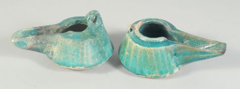 TWO 12TH-13TH CENTURY PERSIAN SELJUK KASHAN TURQUOISE GLAZED POTTERY OIL LAMPS, each approx 11.5cm