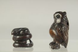 TWO JAPANESE BOXWOOD NETSUKES; owl and snake.