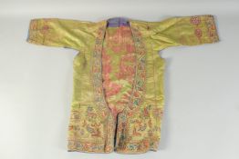 AN ORIENTAL GREEN GROUND SILK JACKET.