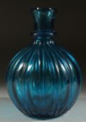AN 18TH CENTURY MUGHAL GLASS HUQQA BASE, 18cm high.