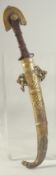 AN ISLAMIC BRASS MOUNTED DAGGER, 43cm long.