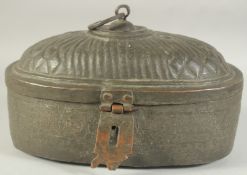 A MAMLUK TINNED COPPER OVAL FORM CANTEEN, with engraved decoration, 34cm x 21cm.