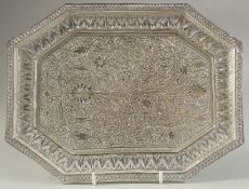 A 19TH CENTURY KASHMIRI ENGRAVED WHITE METAL TRAY, with fine foliate decoration, 30cm x 22.5cm.
