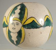 A TURKISH ARMENIAN GLAZED POTTERY HANGING BALL.