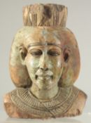 AN EGYPTIAN STONE HEAD, 15cm high.