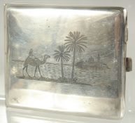 A FINE IRAQI NIELLO SILVER CIGARETTE CASE, 10cm x 8cm.