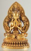 A RARE GILT COPPER ALLOY FIGURE OF TIBETAN BUDDHA, 17cm high.