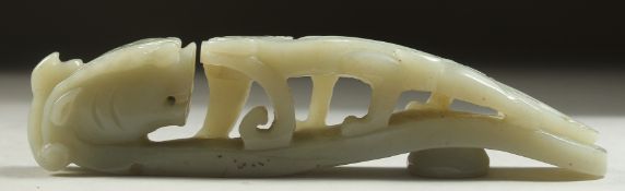 A CHINESE CARVED JADE DRAGON BELT HOOK, 14cm long.