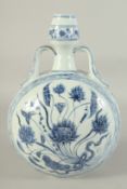 A CHINESE BLUE AND WHITE TWIN HANDLE MOON FLASK VASE, painted with a central floral spray, 33cm