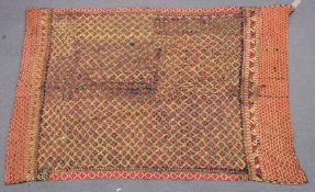 A LARGE 19TH CENTURY INDIAN PHULKARI EMBROIDERED TEXTILE.