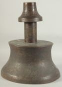 A LARGE ISLAMIC ENGRAVED BRASS CANDLESTICK, with panels of calligraphy and decorative motifs, 40cm