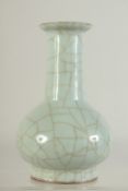 A CHINESE CELADON CRACKLE GLAZE VASE, 17cm high.