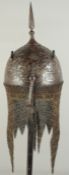 A VERY FINE 19TH CENTURY PERSIAN QAJAR SILVER AND GOLD INLAID CHISELLED HELMET, with figural