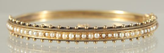 A GOOD VICTORIAN GOLD AND PEARL BROOCH. 2.25ins.