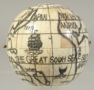 A LARGE ETCHED BONE GLOBE COMPASS. 2.75ins diameter.