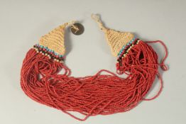 A MULTI CORAL BEAD NECKLACE.