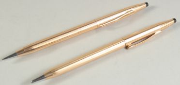 A CASED SET OF TWO CROSS PEN AND PENCILS.