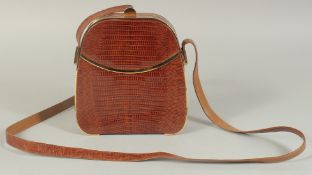 A SMALL MADLER, WEST GERMANY, SNAKESKIN BAG. 5.5ins x 6ins with long straps.