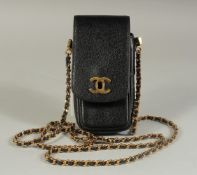 A CHANEL BLACK LEATHER SPECTACLE CASE, 6.5ins x 3ins with a long entwined gilt metal and leather